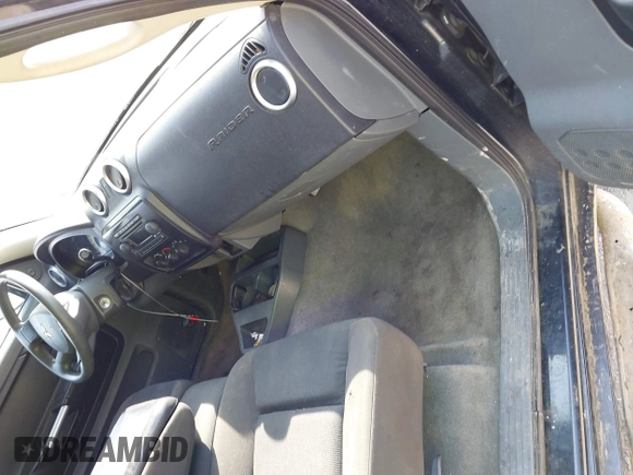 2006 Mitsubishi Raider LS with VIN 1Z7HC22K56S561574, listed as a IAAI auction lot 41757412 with 216,559 mi miles. Bid and sale history available at carsss.com. Image 5.