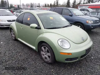 2006 Volkswagen New Beetle Coupe with VIN 3VWRW31C06M402944, listed as a IAAI auction lot 41858922 with 97,518 mi miles. Bid and sale history available at carsss.com. Image 1.