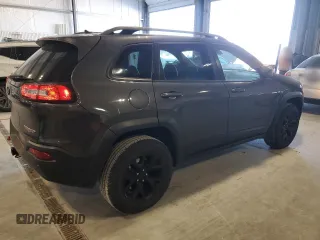 2015 Jeep Cherokee Trailhawk with VIN 1C4PJMBS5FW615845, listed as a Copart auction lot 52824635 with 134,873 mi miles and Salvage Title. Bid and sale history available at carsss.com. Image 3.