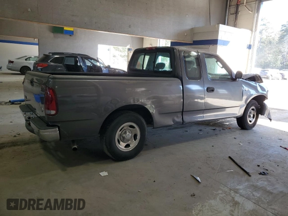 2003 Ford F-150 XL with VIN 1FTRX17263NA82310, listed as a Copart auction lot 76577354 with Not provided miles and Salvage title. Bid and sale history available at DreamBid. Image 3.