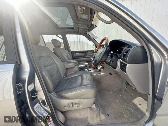 2003 Lexus LX 470 z VIN JTJHT00W933535214, wystawiony jako Copart lot #62037495 z przebiegiem 373 210 mil mil oraz Czysty tytuł • Clean title. Historia ofert i sprzedaży dostępna na DreamBid. Obrazek 5.