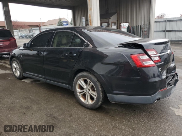 2015 Ford Taurus SEL with VIN 1FAHP2E94FG137935, listed as a Copart auction lot 80921824 with 172,324 mi miles and Salvage Title. Bid and sale history available at DreamBid. Image 2.