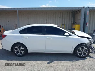 2021 Kia Forte LXS z VIN 3KPF24ADXME348303, wystawiony jako IAAI lot #42082884 z przebiegiem 102 754 mil mil oraz . Historia ofert i sprzedaży dostępna na DreamBid. Obrazek 13.