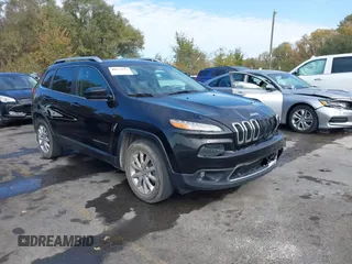 2014 Jeep Cherokee Limited z VIN 1C4PJMDS9EW266300, wystawiony jako IAAI lot #40675527 z przebiegiem 156 133 mil mil oraz . Historia ofert i sprzedaży dostępna na DreamBid. Obrazek 1.