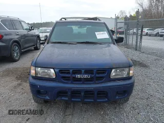 2002 Isuzu Rodeo S with VIN 4S2CK58W824315044, listed as a IAAI auction lot 41532841 with 285,951 mi miles and . Bid and sale history available at DreamBid. Image 6.