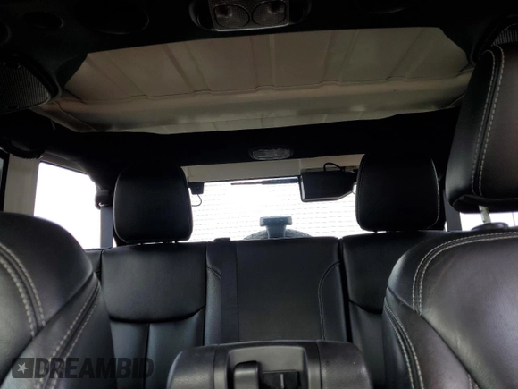 2015 Jeep Wrangler Unlimited Wrangler X with VIN 1C4BJWEG4FL754492, listed as a Copart auction lot 55305825 with 108,078 mi miles and Salvage title. Bid and sale history available at DreamBid. Image 10.