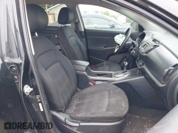 2013 Kia Sportage LX z VIN KNDPBCA28D7411444, wystawiony jako IAAI lot #42415041 z przebiegiem 150 524 mil mil oraz . Historia ofert i sprzedaży dostępna na DreamBid. Obrazek 5.