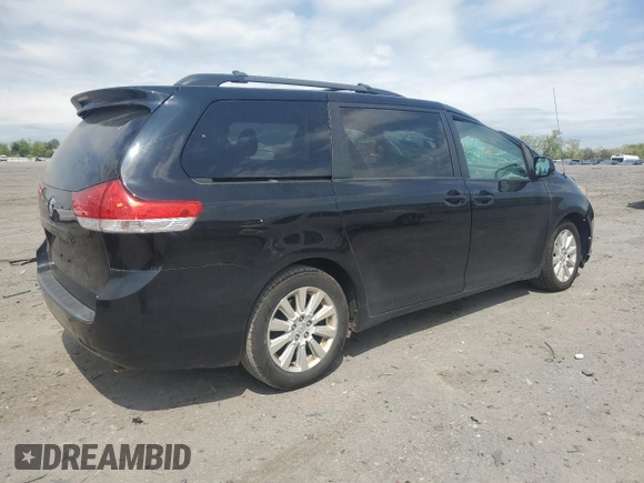 2014 Toyota Sienna Limited z VIN 5TDDK3DC2ES075367, wystawiony jako Copart lot #54010085 z przebiegiem 148 312 mil mil oraz Szkoda całkowita • Salvage title. Historia ofert i sprzedaży dostępna na DreamBid. Obrazek 3.