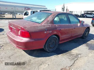 2002 Mitsubishi Galant ES with VIN 4A3AA46G52E117959, listed as a IAAI auction lot 41590791 with 135,310 mi miles. Bid and sale history available at carsss.com. Image 4.