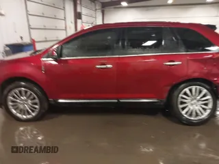 2014 Lincoln MKX z VIN 2LMDJ8JK7EBL00900, wystawiony jako IAAI lot #41714762 z przebiegiem 129 870 mil mil oraz . Historia ofert i sprzedaży dostępna na DreamBid. Obrazek 14.
