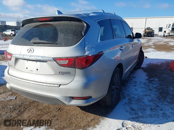 2016 Infiniti QX60 with VIN 5N1AL0MM8GC518533, listed as a IAAI auction lot 41352229 with 100,185 mi miles and . Bid and sale history available at DreamBid. Image 4.