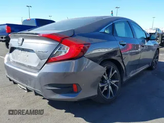 2021 Honda Civic Sedan Sport with VIN 19XFC2F88ME201751, listed as a IAAI auction lot 41643759 with 111,796 mi miles. Bid and sale history available at carsss.com. Image 4.