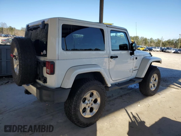 2014 Jeep Wrangler Sahara with VIN 1C4AJWBG1EL168007, listed as a Copart auction lot 87331394 with 113,228 mi miles and Salvage Title. Bid and sale history available at DreamBid. Image 3.