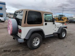 1999 Jeep Wrangler Sport with VIN 1J4FY19S2XP421162, listed as a Copart auction lot 57683835 with 152,636 mi miles and Salvage title. Bid and sale history available at DreamBid. Image 3.