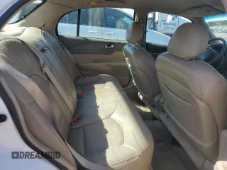 2001 Lincoln Continental z VIN 1LNHM97V31Y673523, wystawiony jako Copart lot #52451385 z przebiegiem 133 879 mil mil oraz Szkoda całkowita • Salvage title. Historia ofert i sprzedaży dostępna na DreamBid. Obrazek 10.