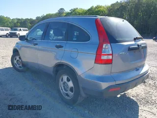 2009 Honda CR-V LX with VIN JHLRE48379C011817, listed as a IAAI auction lot 42059815 with 217,661 mi miles. Bid and sale history available at carsss.com. Image 3.