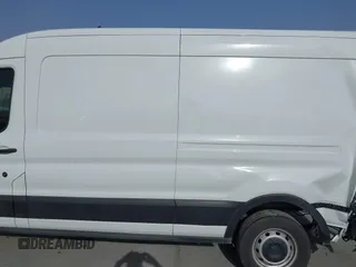 2023 Ford Transit Cargo with VIN 1FTBR1C85PKA32611, listed as a IAAI auction lot 41698153 with 25,010 mi miles and . Bid and sale history available at carsss.com. Image 14.