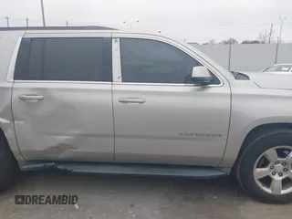 2015 Chevrolet Suburban LT with VIN 1GNSCJKC4FR744208, listed as a IAAI auction lot 41612915 with 87,445 mi miles and . Bid and sale history available at DreamBid. Image 13.