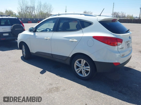 2011 Hyundai Tucson Limited with VIN KM8JUCAC0BU206509, listed as a IAAI auction lot 42034266 with 185,989 mi miles and . Bid and sale history available at DreamBid. Image 3.