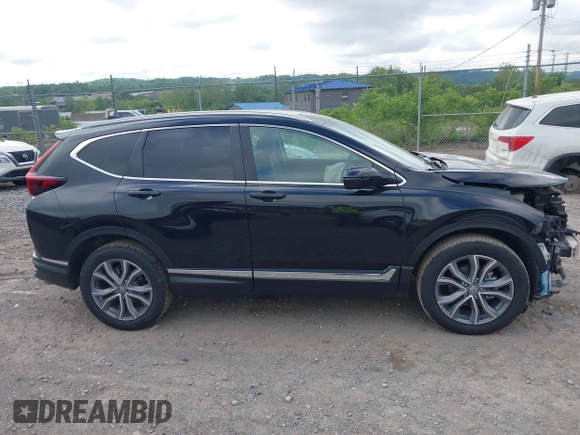 2021 Honda CR-V Touring with VIN 5J6RW2H92ML003064, listed as a IAAI auction lot 42298361 with 70,988 mi miles and . Bid and sale history available at DreamBid. Image 14.