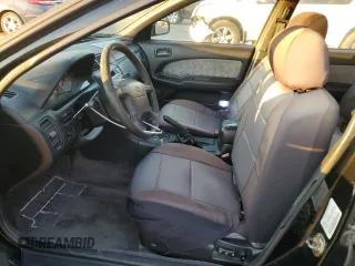 1998 Nissan Maxima GXE с VIN JN1CA21D6WT533634, выставлен на аукционе Copart как лот 83339404 с пробегом 180 356 миль миль и Списание • Salvage title. История ставок и продаж доступна на DreamBid. Изображение 7.