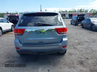 2013 Jeep Grand Cherokee Laredo with VIN 1C4RJEAG2DC517303, listed as a IAAI auction lot 42040405 with 222,952 mi miles. Bid and sale history available at carsss.com. Image 16.