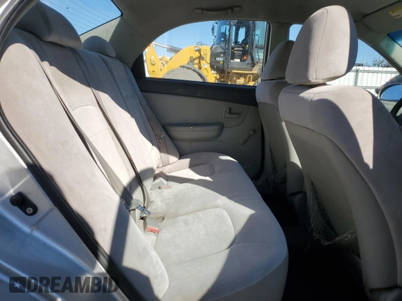 2009 Kia Spectra EX with VIN KNAFE222895603636, listed as a Copart auction lot 75327854 with 169,702 mi miles and Salvage Title. Bid and sale history available at carsss.com. Image 10.