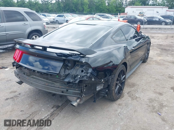 2016 Ford Mustang V6 z VIN 1FA6P8AM8G5251387, wystawiony jako IAAI lot #42231334 z przebiegiem 104 618 mil mil oraz . Historia ofert i sprzedaży dostępna na DreamBid. Obrazek 4.