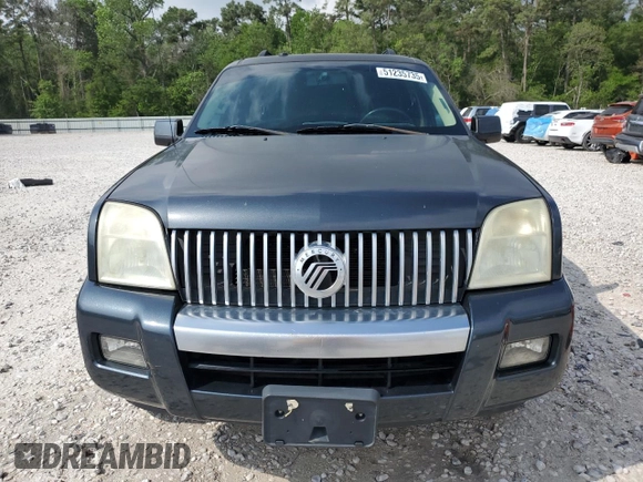 2010 Mercury Mountaineer z VIN 4M2EN3HE2AUJ07385, wystawiony jako Copart lot #51235735 z przebiegiem 174 742 mil mil oraz Szkoda całkowita • Salvage title. Historia ofert i sprzedaży dostępna na DreamBid. Obrazek 5.