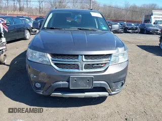 2014 Dodge Journey SXT with VIN 3C4PDCBB2ET156215, listed as a IAAI auction lot 41765840 with 129,737 mi miles and . Bid and sale history available at DreamBid. Image 12.
