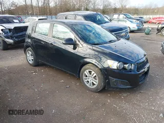 2012 Chevrolet Sonic LT with VIN 1G1JC6SH0C4138936, listed as a IAAI auction lot 41497589 with 72,360 mi miles and . Bid and sale history available at DreamBid. Image 1.
