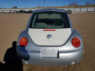 2004 Volkswagen Beetle with VIN 3VWCD31C54M409221, listed as a Copart auction lot 83323024 with 116,352 mi miles and Salvage Title. Bid and sale history available at DreamBid. Image 6.