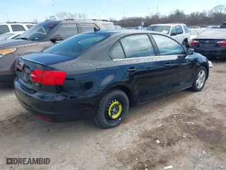 2014 Volkswagen Jetta Sedan TDI with VIN 3VWLL7AJ6EM365286, listed as a IAAI auction lot 41667398 with 135,369 mi miles. Bid and sale history available at carsss.com. Image 4.