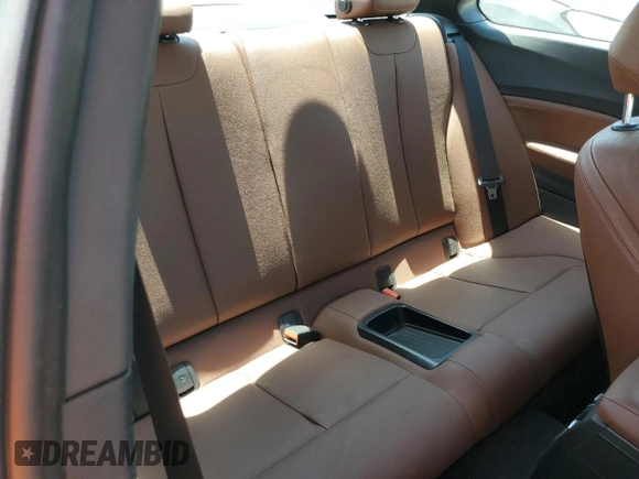 2015 BMW 2 Series M235i with VIN WBA1J7C55FV253647, listed as a Copart auction lot 60231395 with 57,639 mi miles and Salvage title. Bid and sale history available at DreamBid. Image 10.