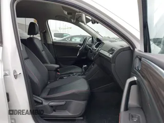 2024 Volkswagen Tiguan Wolfsburg Edition with VIN 3VV5B7AXXRM233917, listed as a IAAI auction lot 42780573 with 11,983 mi miles and . Bid and sale history available at DreamBid. Image 5.