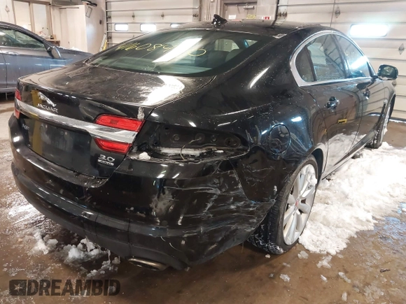 2014 Jaguar XF V6 SC with VIN SAJWJ0EF2E8U13746, listed as a IAAI auction lot 41608420 with 141,476 mi miles. Bid and sale history available at carsss.com. Image 6.