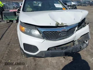 2011 Kia Sorento LX with VIN 5XYKT3A19BG101768, listed as a IAAI auction lot 41879055 with 147,902 mi miles. Bid and sale history available at carsss.com. Image 4.
