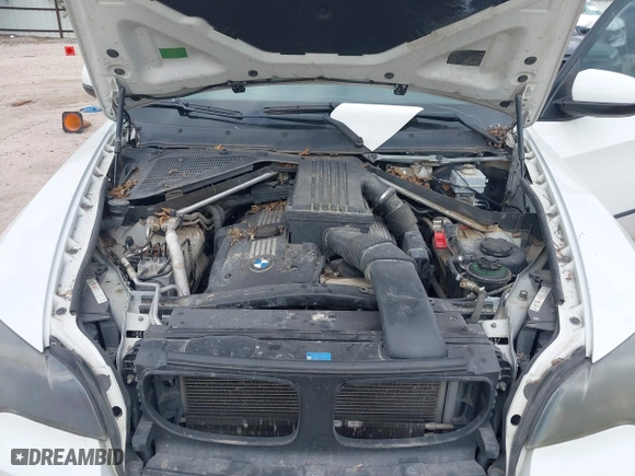 2007 BMW X5 3.0si with VIN 5UXFE435X7L018734, listed as a IAAI auction lot 41501286 with 126,339 mi miles. Bid and sale history available at carsss.com. Image 10.