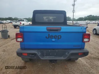 2020 Jeep Gladiator Sport S с VIN 1C6JJTAGXLL171914, выставлен на аукционе Copart как лот 55228435 с пробегом 81 848 миль миль и Списание • Salvage title. История ставок и продаж доступна на DreamBid. Изображение 6.