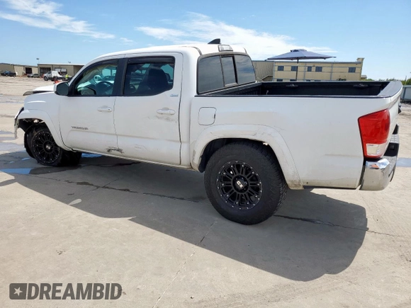 2017 Toyota Tacoma SR5 with VIN 3TMAZ5CN9HM052721, listed as a Copart auction lot 59791615 with 67,019 mi miles and Salvage title. Bid and sale history available at DreamBid. Image 2.