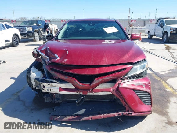 2018 Toyota Camry LE z VIN 4T1B11HK9JU583160, wystawiony jako IAAI lot #41707215 z przebiegiem 134 214 mil mil oraz . Historia ofert i sprzedaży dostępna na DreamBid. Obrazek 13.