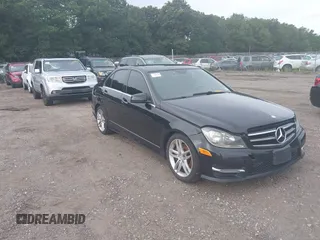 2014 Mercedes-Benz C-Class C 300 Sport with VIN WDDGF8AB5ER318846, listed as a IAAI auction lot 40087045 with 999,999 mi miles. Bid and sale history available at carsss.com. Image 1.