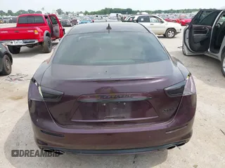 2019 Maserati Ghibli z VIN ZAM57YSL8K1312731, wystawiony jako IAAI lot #42240495 z przebiegiem 31 822 mil mil oraz . Historia ofert i sprzedaży dostępna na DreamBid. Obrazek 16.