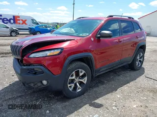 2015 Jeep Cherokee Trailhawk with VIN 1C4PJMBS0FW728361, listed as a IAAI auction lot 41978853 with 123,127 mi miles. Bid and sale history available at carsss.com. Image 2.