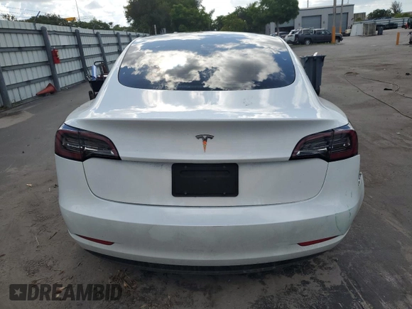 2023 Tesla Model 3 z VIN 5YJ3E1EA7PF576489, wystawiony jako Copart lot #61039505 z przebiegiem 35 243 mil mil oraz Nie do naprawy • Non repairable. Historia ofert i sprzedaży dostępna na DreamBid. Obrazek 6.