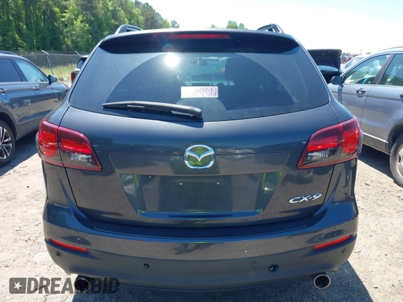 2014 Mazda CX-9 Touring with VIN JM3TB2CA0E0438247, listed as a IAAI auction lot 42190891 with 142,117 mi miles and . Bid and sale history available at carsss.com. Image 16.