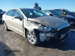 2018 Ford Fusion S z VIN 3FA6P0UU8JR271589, wystawiony jako IAAI lot #41318471 z przebiegiem 148 793 mil mil oraz . Historia ofert i sprzedaży dostępna na DreamBid. Obrazek 1.