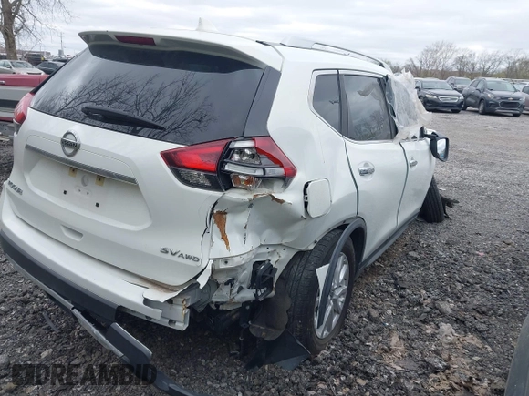 2018 Nissan Rogue SV with VIN KNMAT2MV9JP565109, listed as a IAAI auction lot 42048532 with 121,042 mi miles. Bid and sale history available at carsss.com. Image 4.