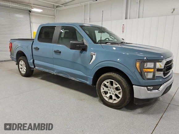 2023 Ford F-150 XL with VIN 1FTEW1C89PKE14033, listed as a Copart auction lot 58328605 with 53,902 mi miles and Clean title. Bid and sale history available at DreamBid. Image 4.