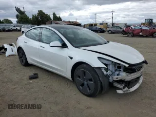 2022 Tesla Model 3 with VIN 5YJ3E1EA4NF207232, listed as a Copart auction lot 54414805 with Not Provided miles and Salvage Title. Bid and sale history available at DreamBid. Image 4.